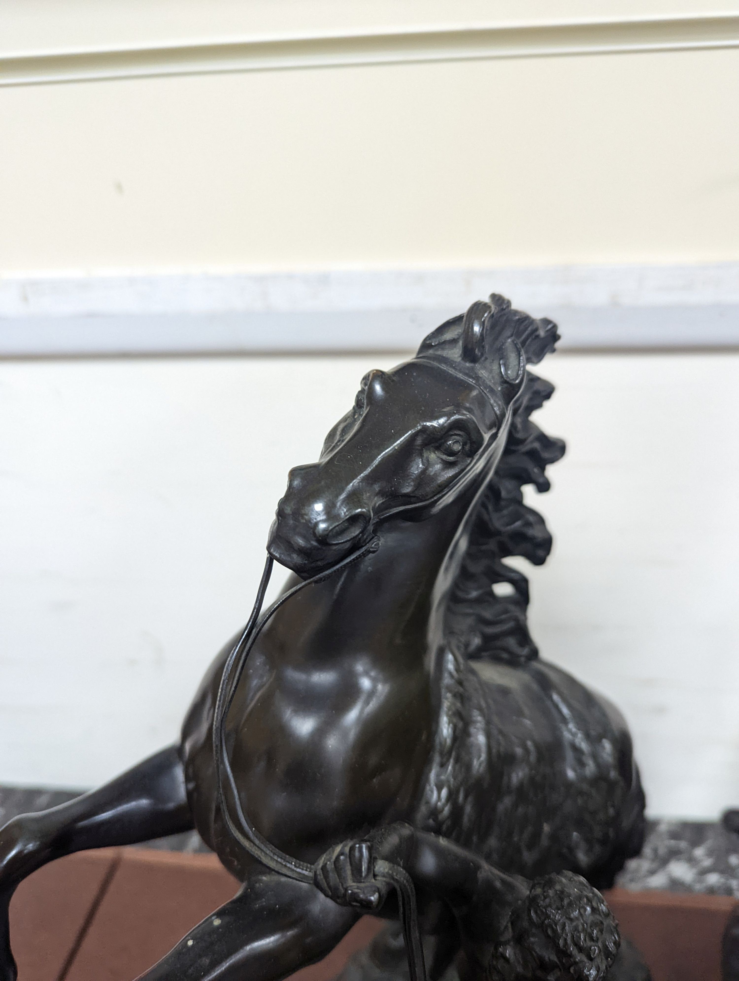 After Coustou, a pair of bronze Marly horses 41cm